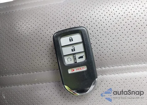 2019 Honda Cr-V Touring z USA, uszkodzony, nr VIN 7FARW2H99KE030661